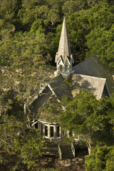 Church aerial in trees.