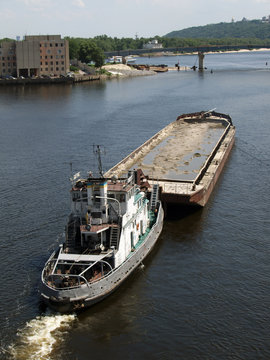 Tug Boat With Barge