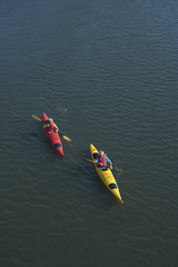 Boys ocean kayaking.