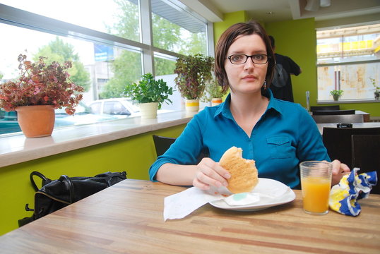 woman eating at an restaurant