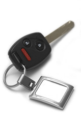 Car key with wireless remote showing a blank tag for custom text