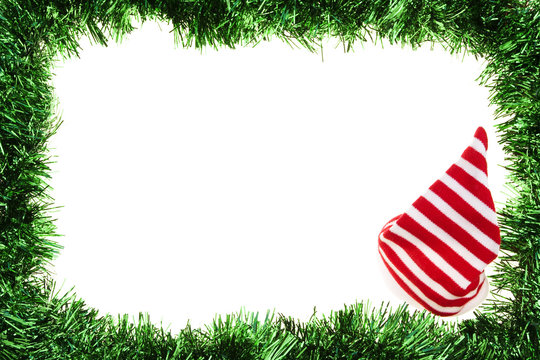 Green garland frame with striped stocking hat