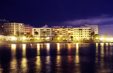 the beach of santa eulalia at sunset