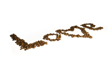 The word "Love" spelled with dark roast coffee beans