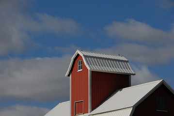 Red Barn Roof and Blue Sky