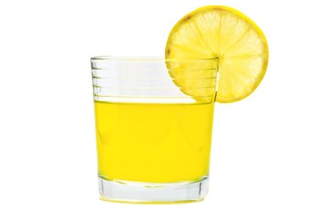 Glass with lemonade isolated on white background