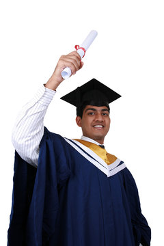 Young Indian graduation picture isolated.