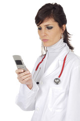 Young Girl doctor with mobile phone over white background