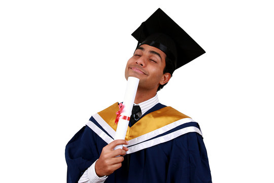 Young Indian graduation picture isolated with clipping path.