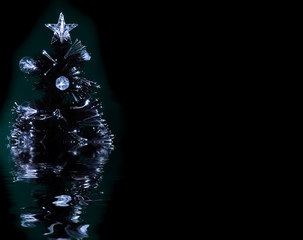 Details of a fibre-optic decorated Christmas Tree