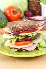 big sandwich and everything you need to have delicious breakfast