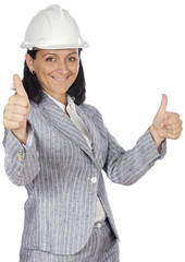Worker woman with helmet and thumbs up