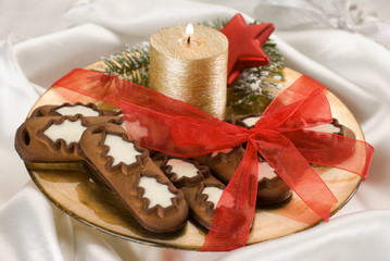 Christmas still life with cookies and candle.