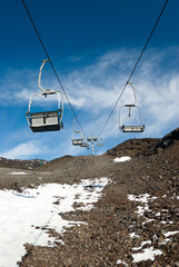 Chair skilift for skiers on the volcano Etna