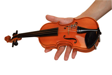 Small violin in a hand. A white background