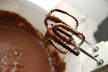 close of mixing spoons