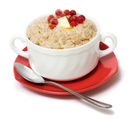 Porridge with berries on white background