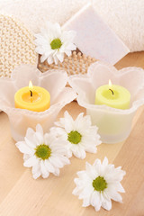 Obraz na płótnie Canvas beauty treatment - towel candles and flower 