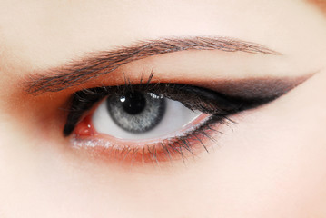 Obraz premium Make-up style of arrow. Woman eye with fashion desing.