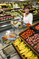 Woman grocery shopping.