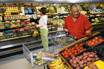 People shopping for produce.