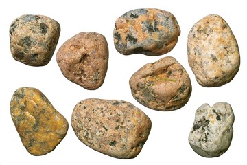 Varicolored granite and quartz round gravel stones.