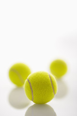 Three tennis balls.