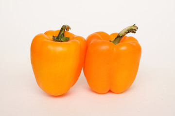 two yellow peppers