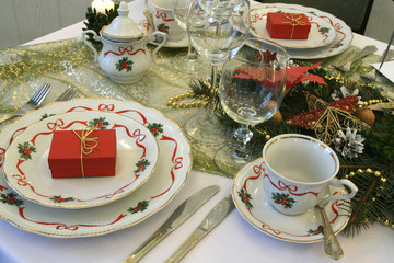 Christmas table with decorative porcelain,