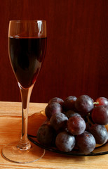 Red wine and grapes. Cuisine and food image.