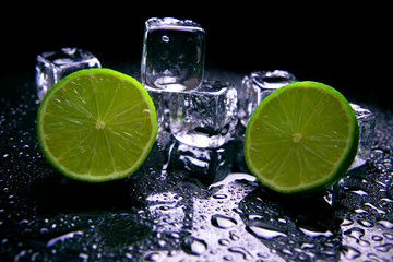 Lime fruits with ice cubes