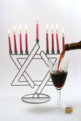 Menora with candles and wine