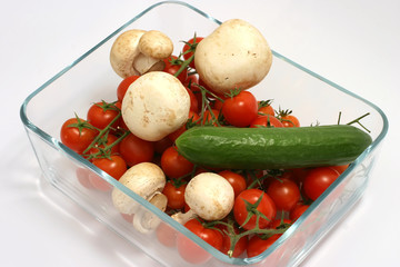Cherry tomato,mushroom and cucumber in transparent bowl