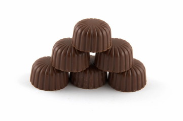 Sweets chocolate with a stuffing, on a white background
