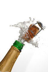 Close up of champagne cork popping with white background © Nikola Bilic