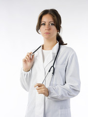 cute brunette in white medical gown   and a stethoscope