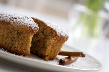 Gingerbread muffin decorated with cinnamon sticks
