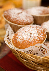 Gingerbread muffins decorated with powdered sugar