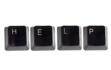 the word help written with computer key on white