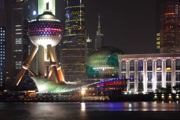 Schilderijen op glas Shangahai with its spectacular evening skyline © Alexander Y