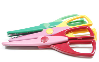 Colorful craft scissors isolated over white
