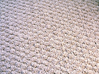 close up photo of berber carpet pattern