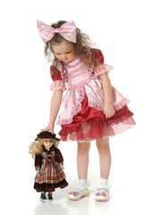 The little girl with doll