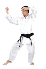 Black belt karate expert with fight stance