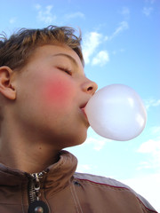 Boy with chewing gum bubble 5