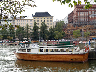 Small sightseeing ship waiting for customers, view