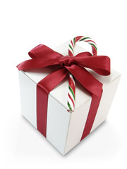 White Gift Box wrapped with Red Bow and Candy Cane