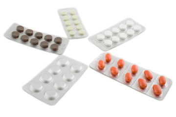 Set of pills blister packings isolated on white