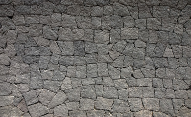 Stone wall made of volcanic rocks