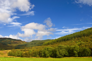 Fototapeta na wymiar Mountain landscape with cloudy sky in Scotland